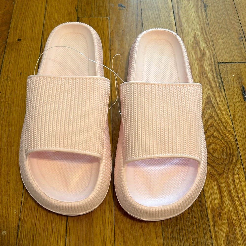Pink slides never worn. Size 11.